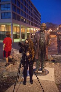 MCC student Bethany Couture and Frederick Douglass statue at the Corinthian Hall site photo shoot.