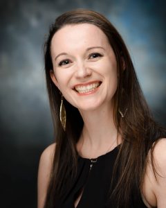 Professional headshot photo of Lori Bartkovich smiling at the camera.
