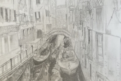 A detailed pencil drawing of a charming canal in venice with stone buildings along both sides and 4 gondolas in the water.