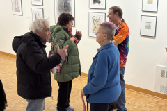 visitors enjoying opening reception for Anne Havens Exhibition.