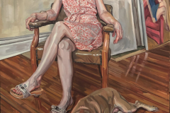 Painting by Artist Baxter Knowlton, showing a woman wearing a pink dress, sitting comfortably in a chair. At her feet lies a sleeping dog.