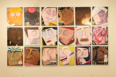 Installation shot of the rear gallery wall, containing 18 paintings in a grid.