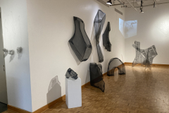Image showing installation of art in the Mercer Gallery. Abstract forms on the floor and wall.