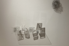 Image showing installation of art in the Mercer Gallery. Abstract sculptures on a clear shelf attached to the wall.
