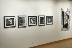 Installation shot of David Jung Exhibition. This image shows one large painting and five small paintings.