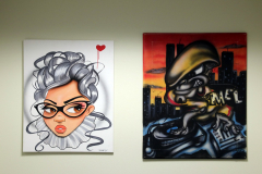 Detail image of artwork hanging in building 12 second floor. This area is known as Farrell Way. Artwork shown by Victor "Range" Zarate and Carmelo "Melo 147" Ortiz