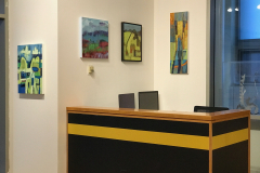 Installation shot of Judy Gohringers Mercer Gallery exhibition. This image shows four paintings located near the entrance of the gallery, around the desk area in the gallery.