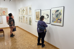 visitors enjoying opening reception for Julianna Furlong Williams Exhibition.