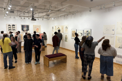 visitors enjoying opening reception for Julianna Furlong Williams Exhibition.