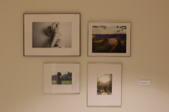Detail image of artwork hanging in building 4 near the photography studio. This area is known as The Lagerway - Prather Gallery. Artwork shown by Emily Baker, Anthony Bristol, Alex Rogan, and Kylie Newcomer