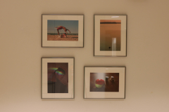 Detail image of artwork hanging in building 4 near the photography studio. This area is known as The Lagerway - Prather Gallery. Artwork shown by Jah'feieth Elliot, Tyler Cutting, Shane Smith, and Blu Doh Say