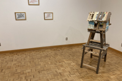 Installation photography of Nate Hodge Exhibition. In the image we see  three framed drawings hanging on the wall on the right, and a floor sculpture on the right.