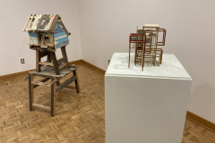 Installation photography of Nate Hodge Exhibition. In the image we see  a floor sculpture on the left and a smaller sculpture on a pedestal on the right.