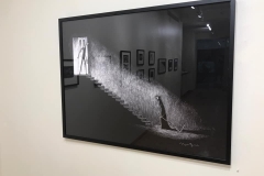 Installation shot of rear gallery wall containing 1 comic illustrations.