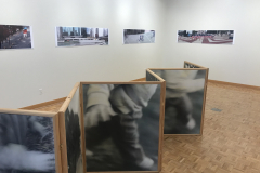 Installation shot of Philip Lange Exhibition, including sculptural folding photograph on floor and four images on back wall.