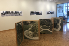 Installation shot of Philip Lange Exhibition, including sculptural folding photograph on floor and three images on back wall.