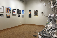 Installation shot of the galleries rear left corner, including some of the left and rear wall.