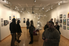 Image showing the gallery and people viewing the artwork.