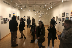 Image showing the gallery and people viewing the artwork.