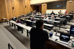 visitors enjoying lecture for WALL\THERAPY Exhibition.