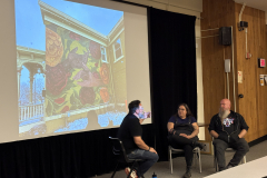 visitors enjoying lecture for WALL\THERAPY Exhibition.