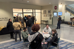 visitors enjoying opening reception for WALL\THERAPY Exhibition.