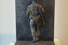 Wayne Williams installation, showing bronze sculpture of military figure.