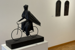 Wayne Williams installation, showing various sculptures along the left wall.