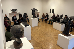 visitors enjoying lecture for Wayne Williams Exhibition.
