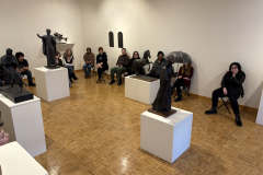 visitors enjoying lecture for Wayne Williams Exhibition.
