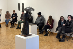 visitors enjoying lecture for Wayne Williams Exhibition.
