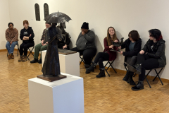 visitors enjoying lecture for Wayne Williams Exhibition.